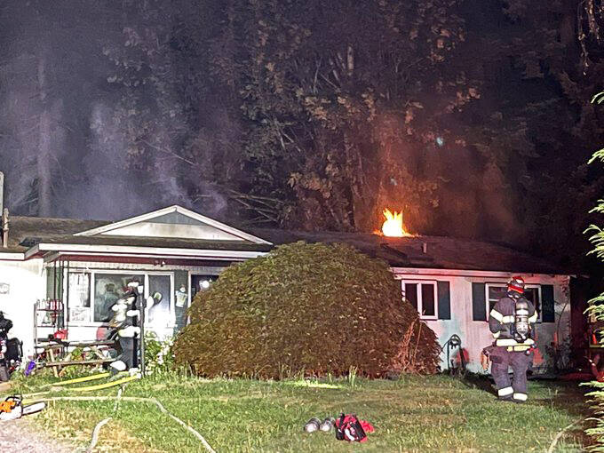 Firefighters battle a house fire Aug. 12 in the 12600 block of SE 270th St. in Kent. COURTESY PHOTO, Puget Sound Fire