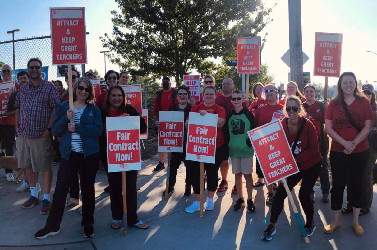 Kent teachers during an informational picket. Teachers will be on strike Thursday, Aug. 25 at schools across the district, which will delay the start of the 2022-2023 school year in the Kent School District. COURTESY PHOTO, Kent Education Association