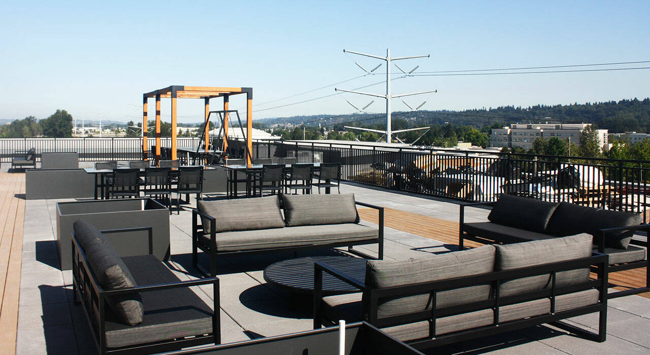A rooftop patio is one of the amenities at the Madison Plaza Apartments. STEVE HUNTER, Kent Reporter