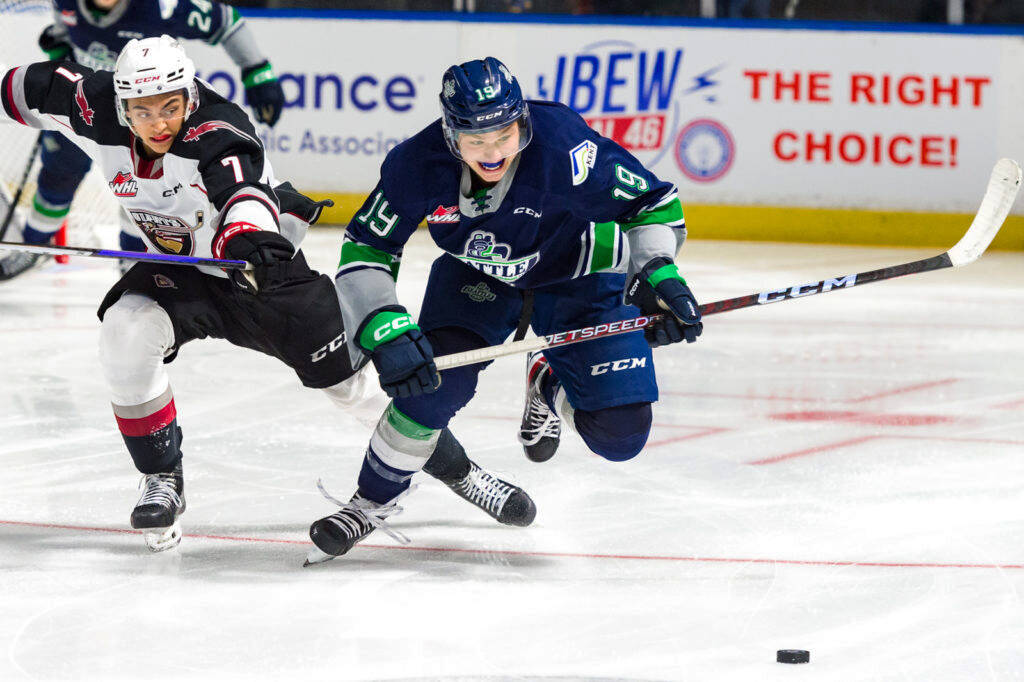 Seattle’s Sam Oremba chases down the puck against Vancouver during a 6-4 win Oct. 1 at the accesso ShoWare Center in Kent. COURTESY PHOTO, Brian Liesse, Seattle Thunderbirds