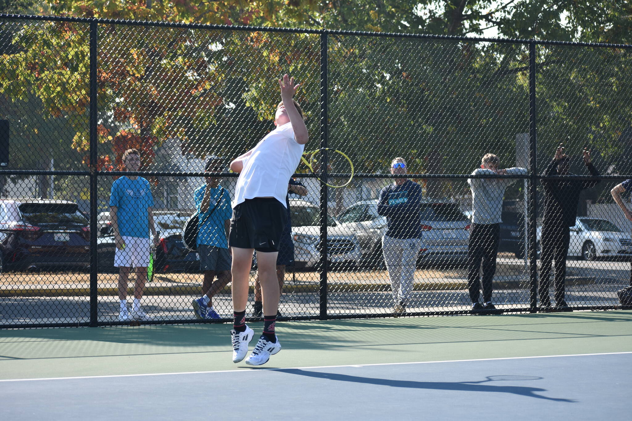 Top seed Cole Fredericks of Kentlake serving in his first match Oct. 14. Photo by Ben Ray/Sound Publishing
