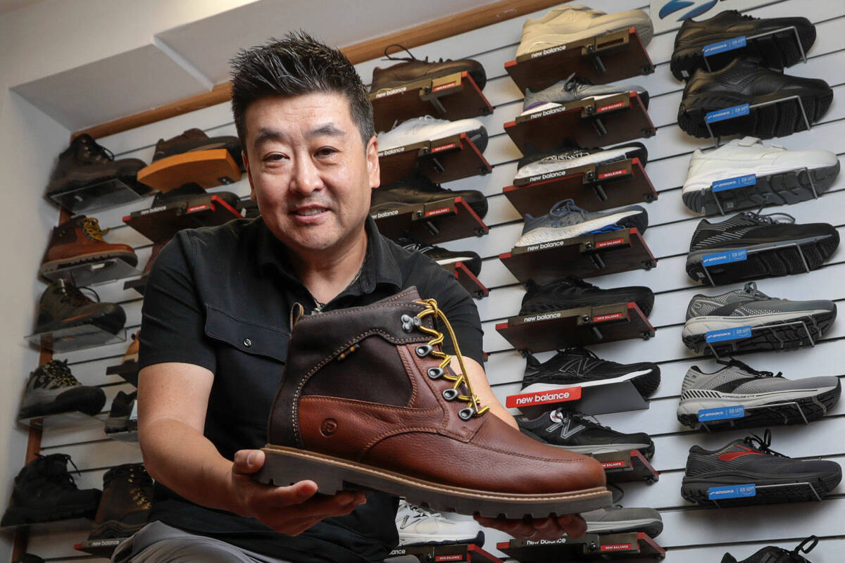 Wide Shoes Only store owner Dominic Ahn offers more than 600 styles of shoes for people with wide feet. His parents started the first store 42 years ago. The stores are in Edmonds and Renton. (Kevin Clark / The Herald)