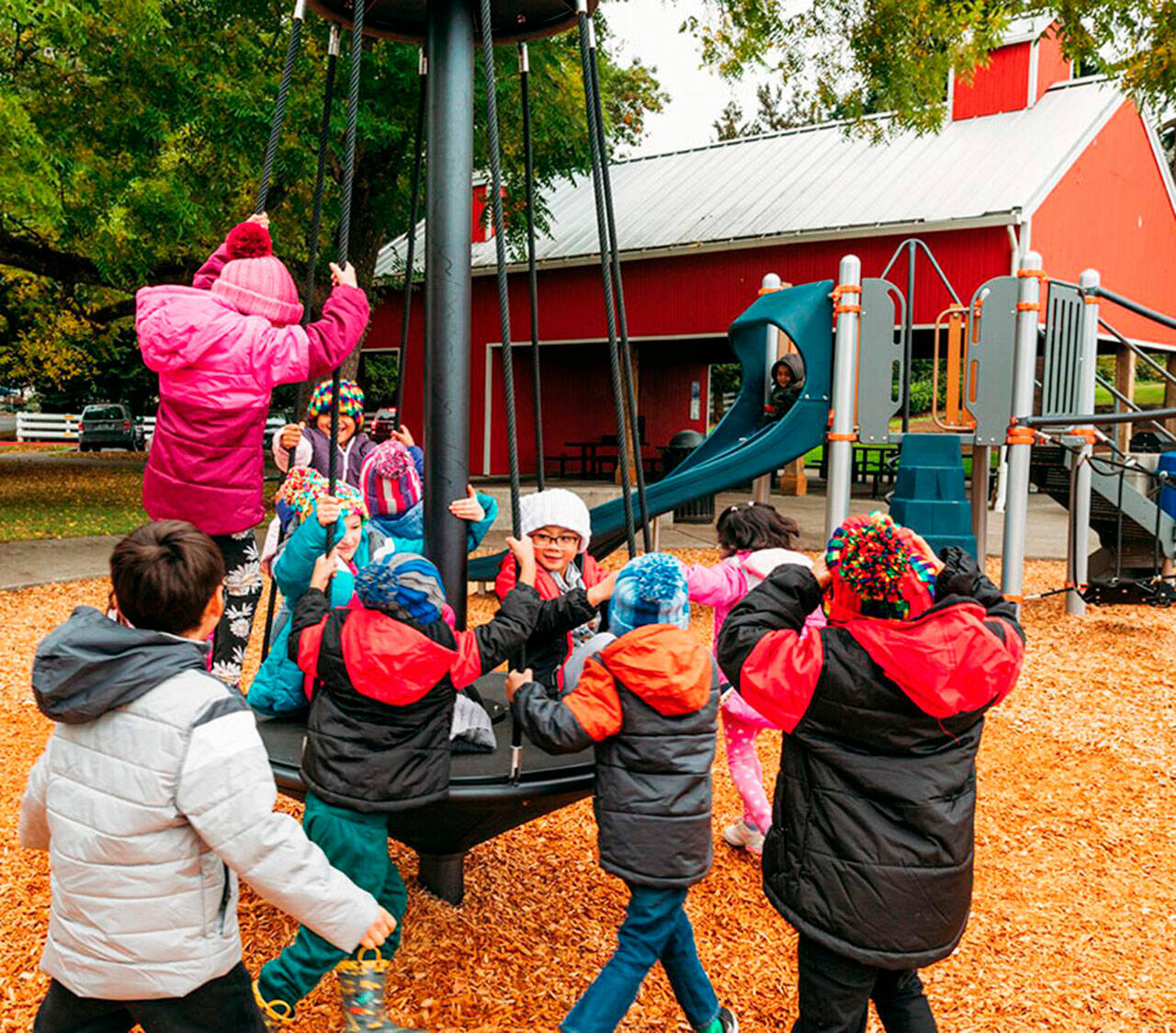 Students from Springbrook Elementary School check out the new play equipment at Chestnut Ridge Park in Kent. COURTESY PHOTO, City of Kent