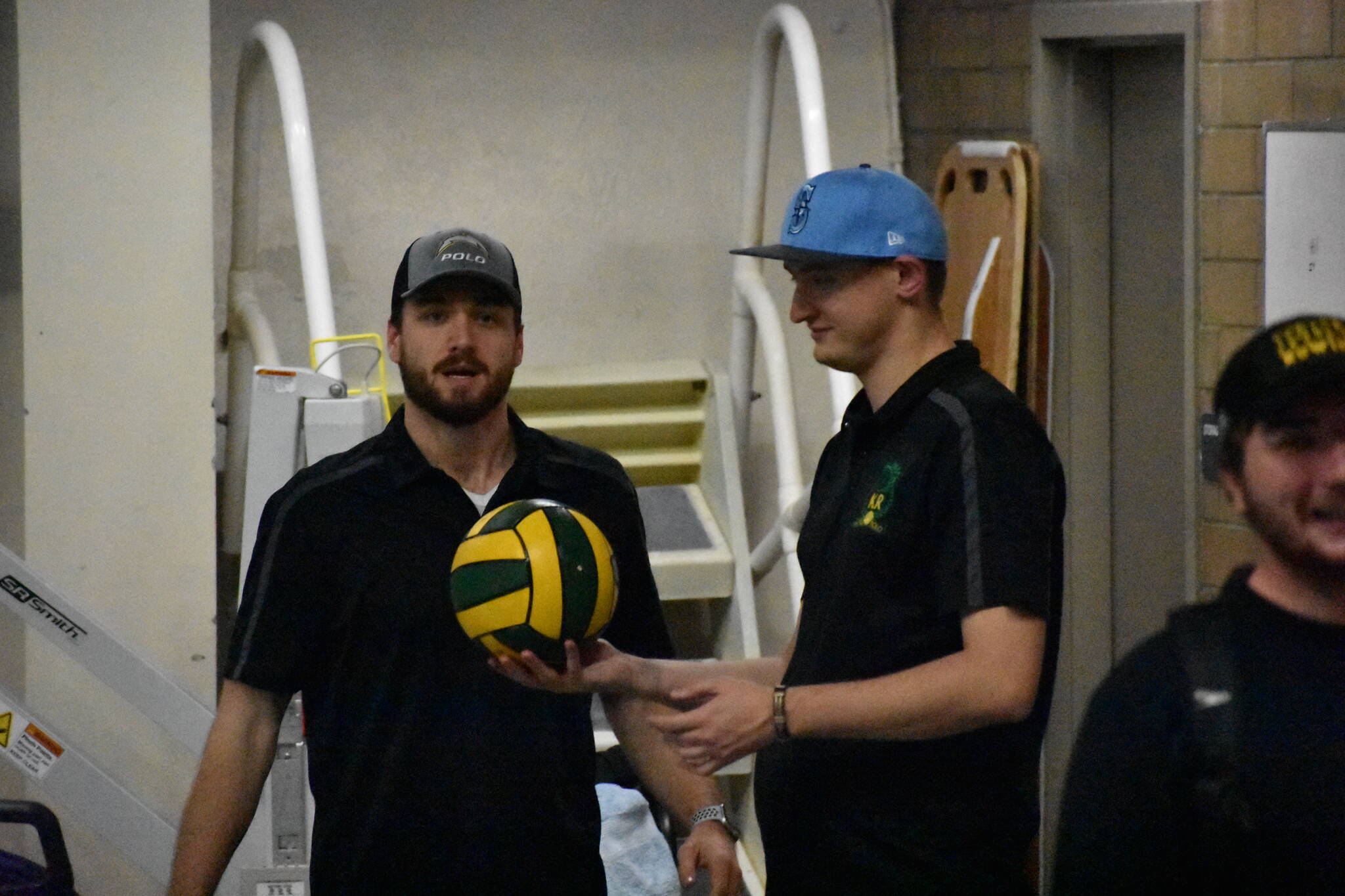 Jake Davies (left) and Jonathan Borte (right) drumming up a strategy at the ASD Spookfest Water Polo Tournament. Photo by Ben Ray/Sound Publishing