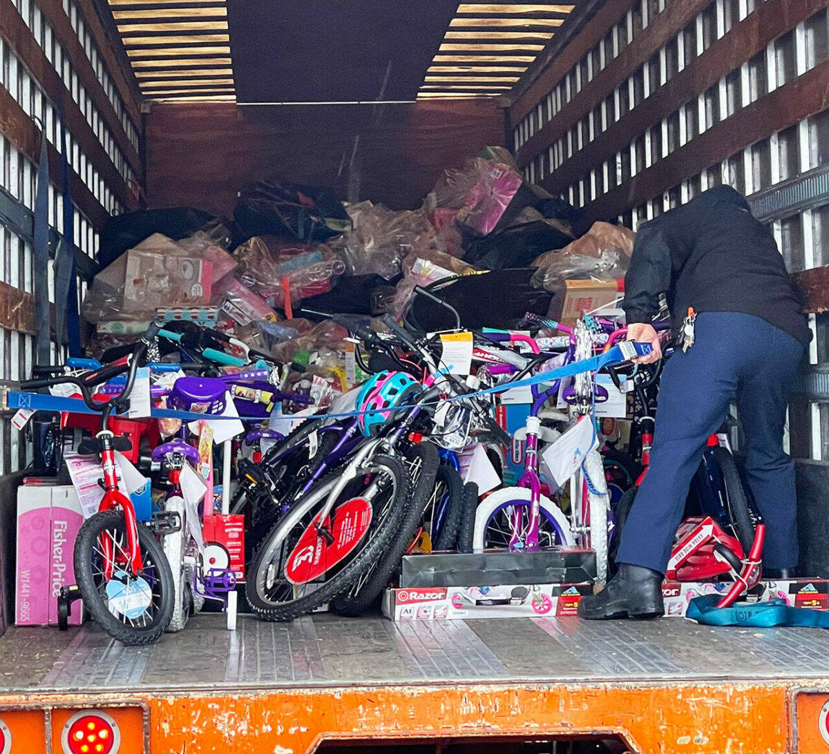 Crews drop off gifts collected in 2021 for the Puget Sound Fire Toys for Joy program. COURTESY FILE PHOTO, Puget Sound Fire