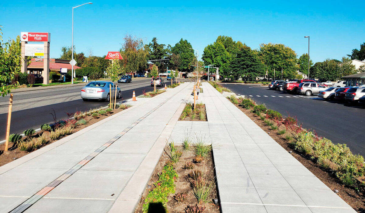 A look at the Meet Me on Meeker sidewalk and bicycle lane upgrades completed in 2020 looking east in front of the Riverbend Driving Range on West Meeker Street in Kent. COURTESY PHOTO, City of Kent