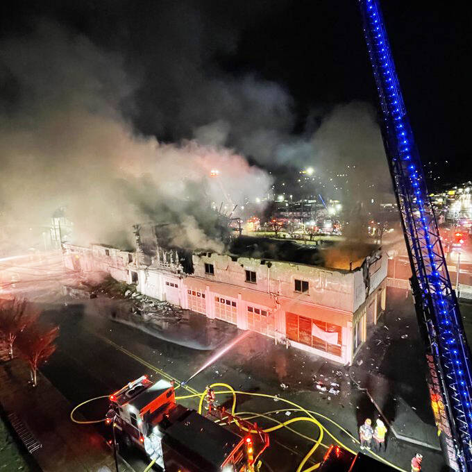 Firefighters battle a blaze Friday morning, Dec. 9 at a Kent warehouse at 105 W. Smith St. COURTESY PHOTO, Puget Sound Fire