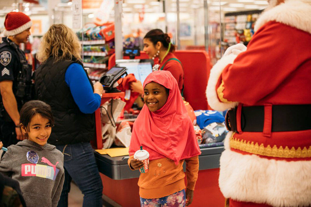 Two of the children at the 9th annual Kent Shop with a Cop Dec. 10 at Target. COURTESY PHOTO, Kent Police
