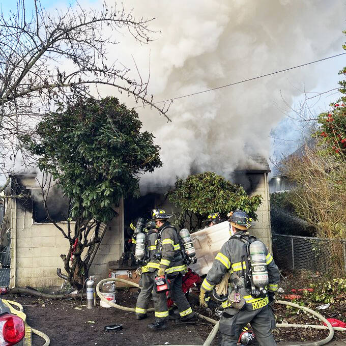 Firefighters contain a fire Jan. 6 at a vacant Kent home along Bridges Avenue South near downtown. COURTESY PHOTO, Puget Sound Fire