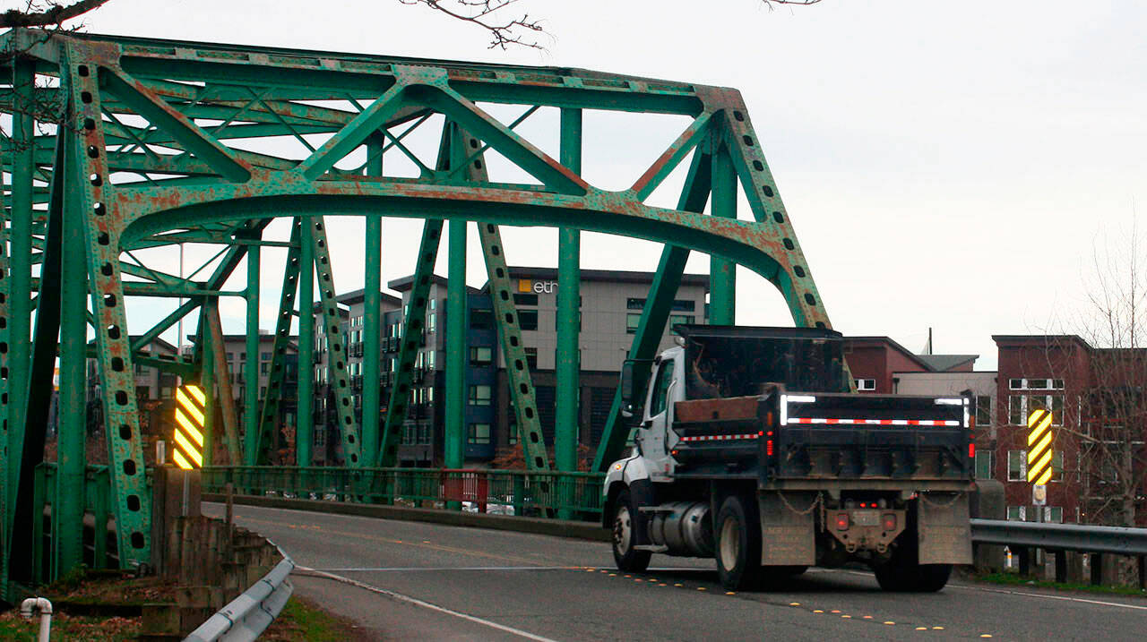 A truck prepares to cross the Meeker Street Bridge, which was built in 1958. STEVE HUNTER, Kent Reporter