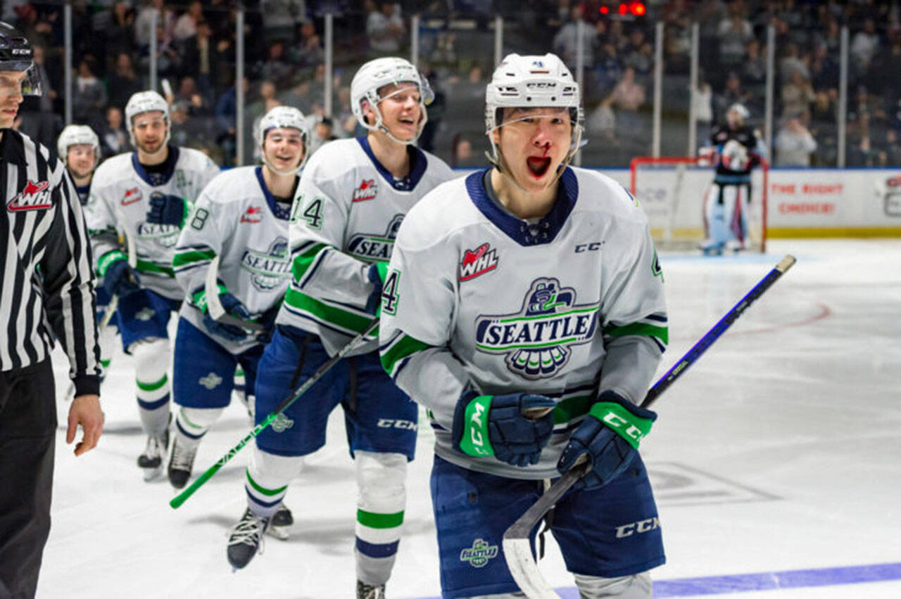 The first-place Seattle Thunderbirds celebrate during their win against Portland Feb. 25 at the ShoWare Center in Kent. COURTESY PHOTO, Brian Liesse, Seattle Thunderbirds