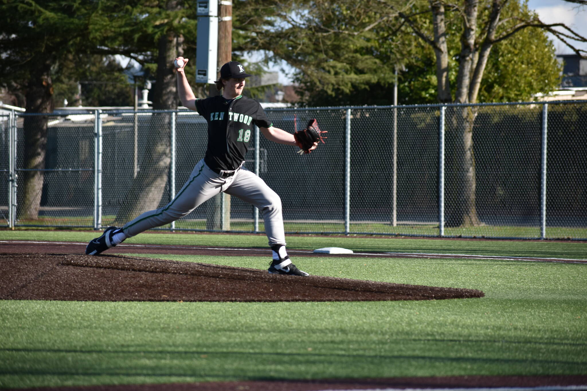 Kentwood’s starting pitcher Tyler Maurer faces Liberty on March 14. Ben Ray / The Reporter