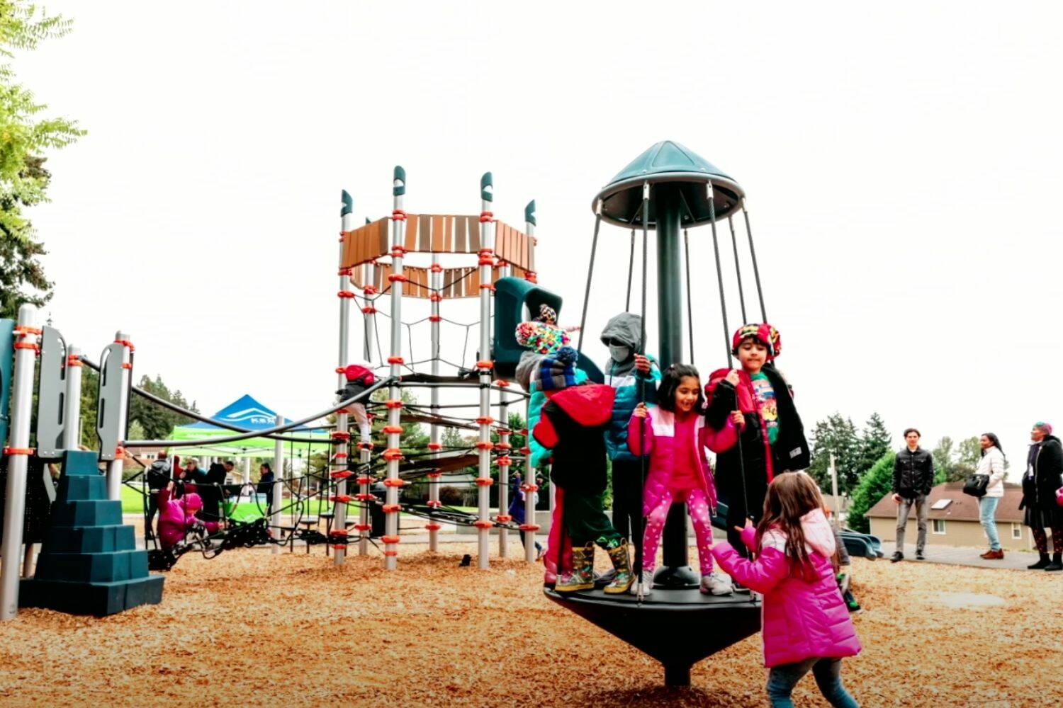 Kids try out the new play structure at Chestnut Ridge Park. (Screenshot from City of Kent Youtube page)