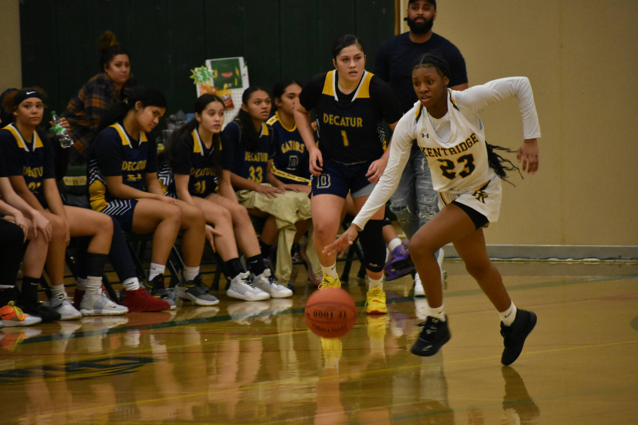 Kentridge’s Jayla Brown dribbles the ball up the floor against Decatur. Ben Ray / The Reporter