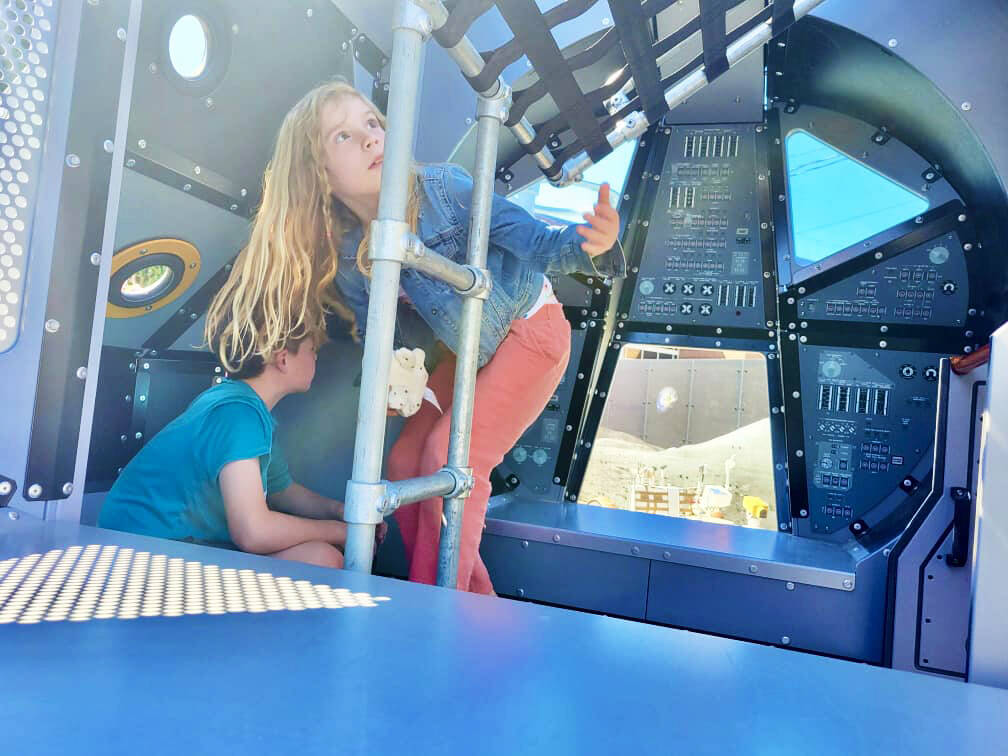 Children check out the view from the inside the Lunar Lander play structure at Kherson Park. COURTESY PHOTO, City of Kent Parks