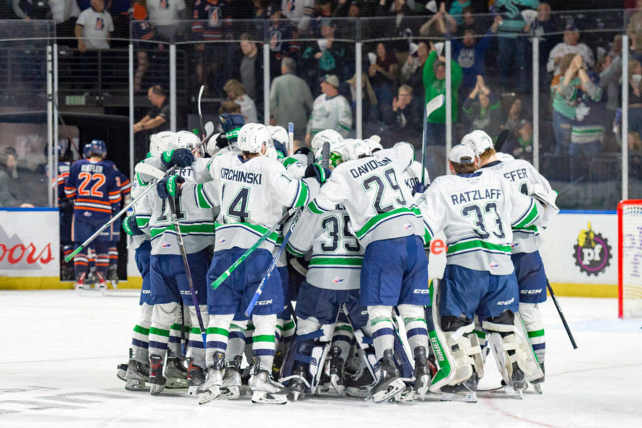 The Seattle Thunderbirds celebrate their 4-3 overtime win against the Kamloops Blazers in game two of the Western Conference finals Sunday, April 30 at the accesso ShoWare Center in Kent. COURTESY PHOTO, Brian Liesse, Seattle Thunderbirds