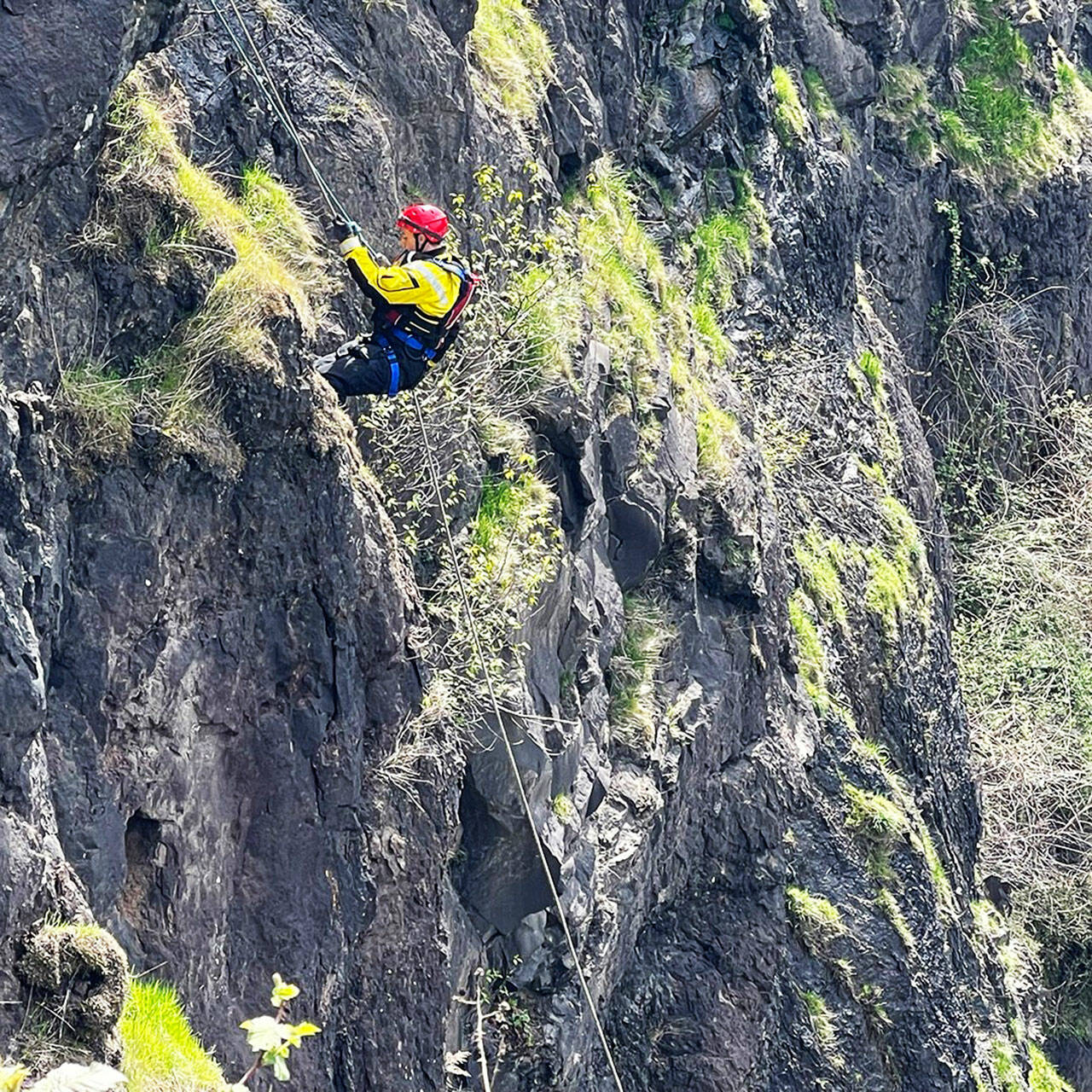 A firefighter rappels 150 feet to the Snoqualmie River as part of a training mission. COURTESY PHOTO, Puget Sound Fire