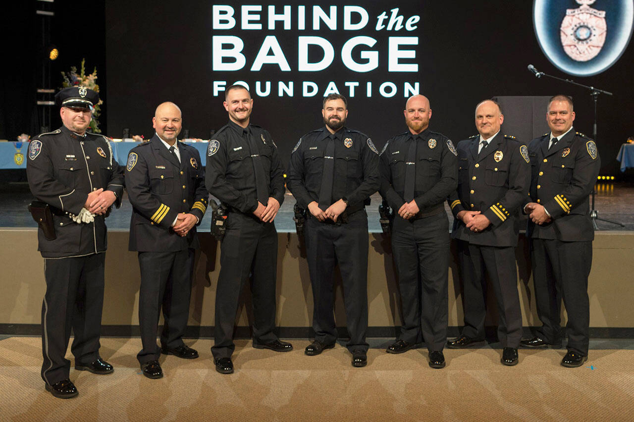 From left to right: Honor Guard Sgt. Davis, Kent Police Chief Rafael Padilla, Kent Officers Sean Goforth, Jace Sloan and Beau Mattheis, Assistant Chiefs Eric Hemmen and Jarod Kasner. COURTESY PHOTO, Kent Police