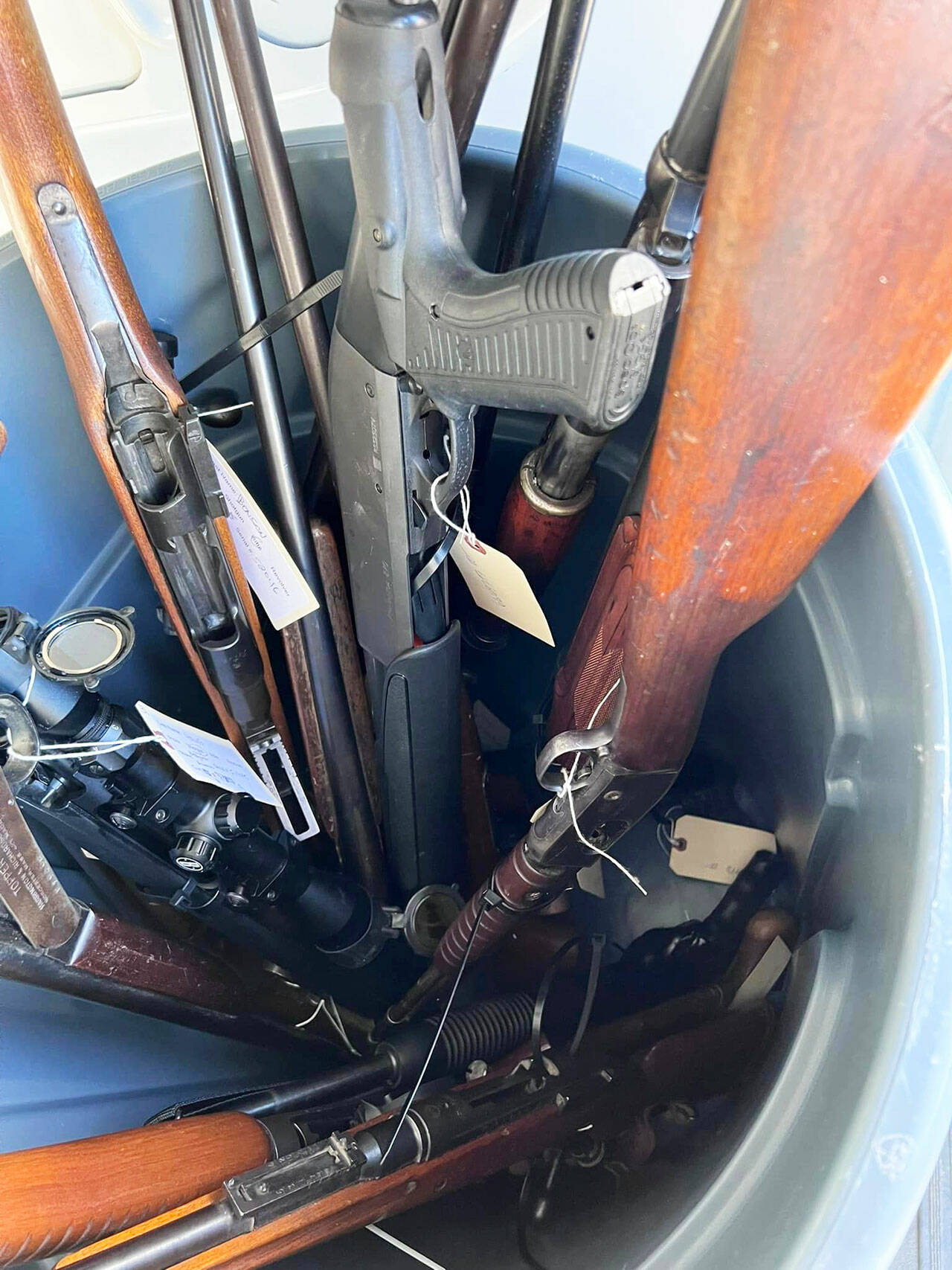 Several of the guns collected by Kent Police during a June 3 gun buyback. COURTESY PHOTO, Zandria Michaud/Kent Police