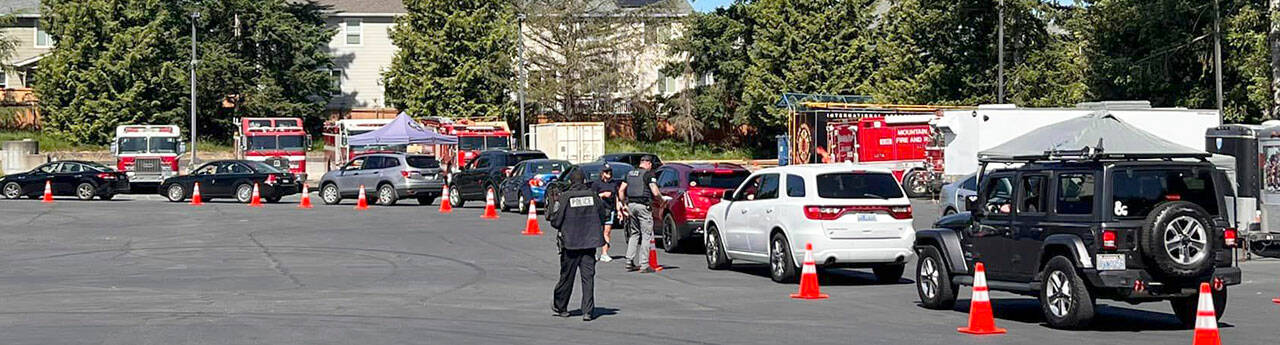 Vehicles line up to return guns June 3 at the Kent Police/Fire Training Center, 24523 116th Ave. SE. COURTESY PHOTO, Zandria Michaud, Kent Police