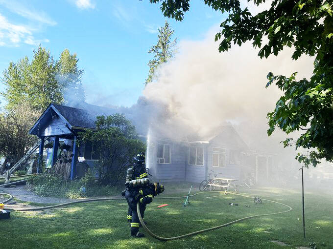 It took firefighters more than two hours to extinguish the house fire. COURTESY PHOTO, Puget Sound Fire