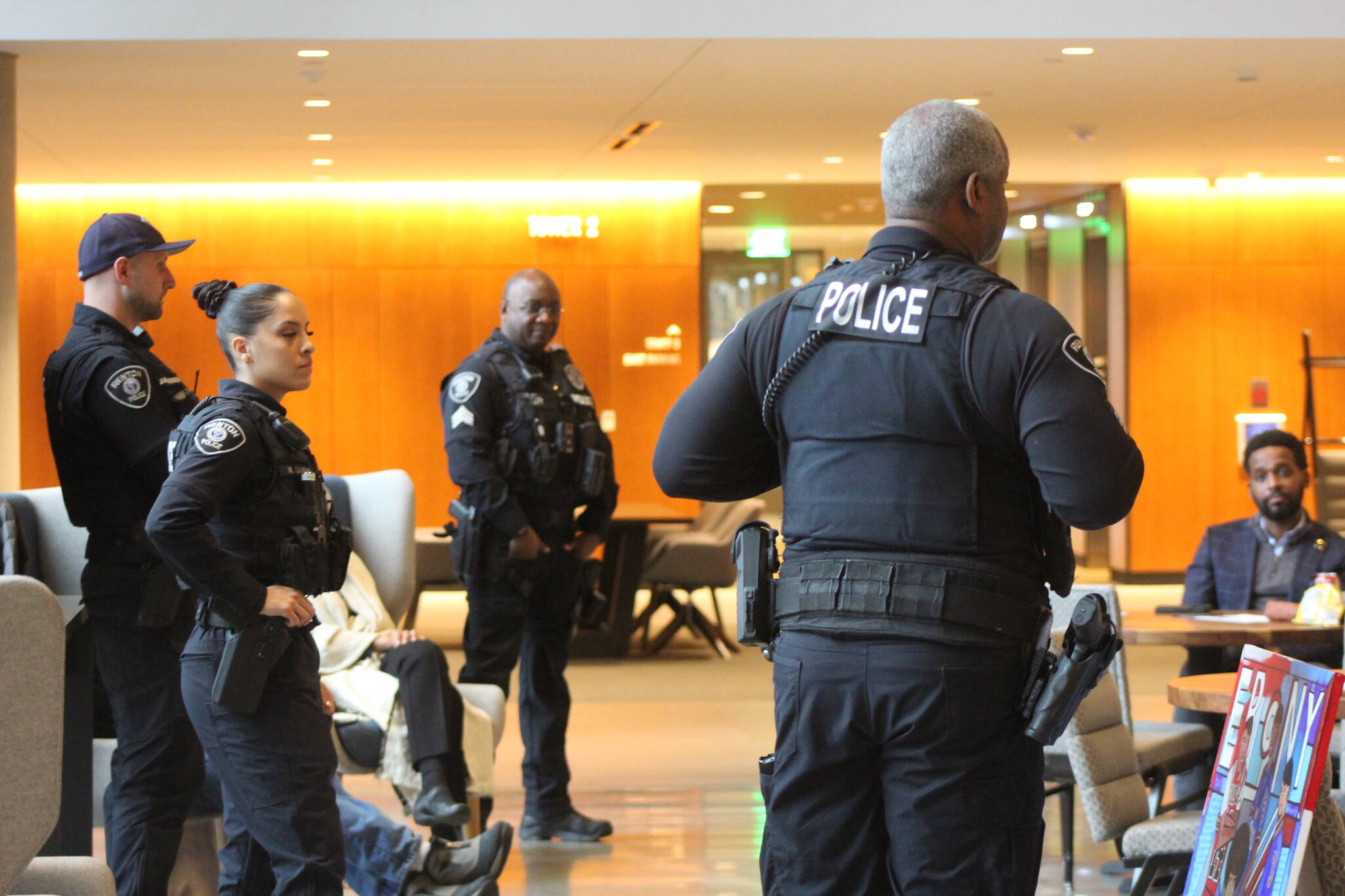 A major part of the forum was an open discussion with Renton Police officers. From left to right: Joe Wisniewski, Micaela Castain, Sgt. Clarence Tolliver and Sgt. Corey Jacobs. Photo by Bailey Jo Josie/Sound Publishing.