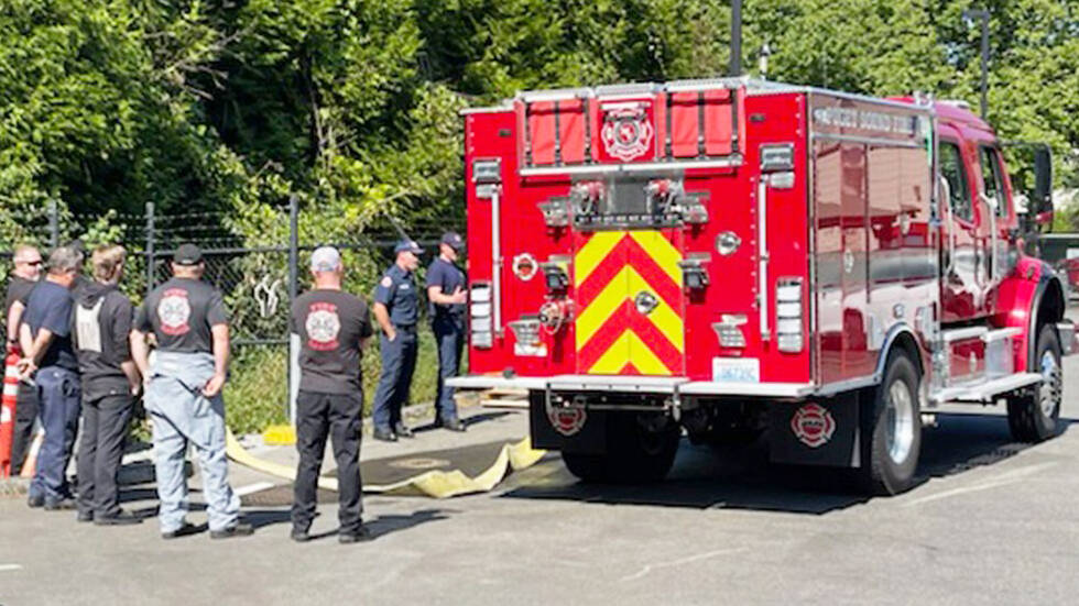 Crews receive training information about Puget Sound Fire’s new wildland fire engines. COURTESY PHOTO, Puget Sound Fire