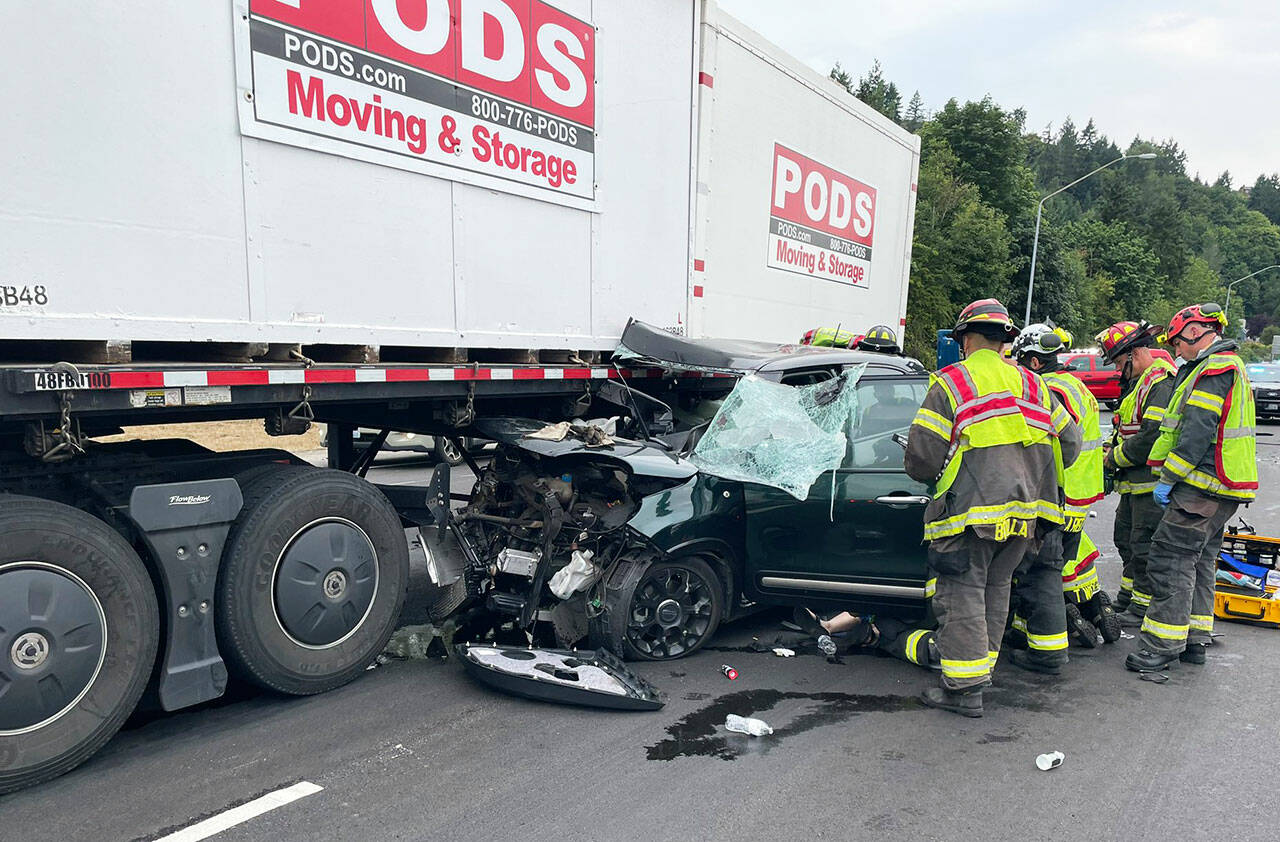 The driver of this car escaped with non-life-threatening injuries in a crash just after 11 a.m. Saturday, Aug. 5 near the intersection of Kent Des Moines Road, West Meeker Street and Reith Road. COURTESY PHOTO, Puget Sound Fire