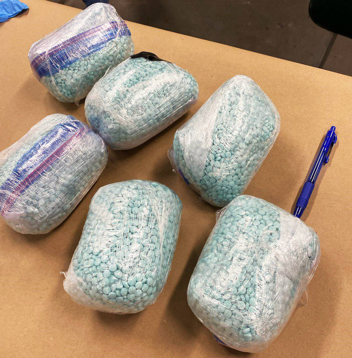 Seattle Police and other law enforcement agencies seized an estimated 30,000 fentanyl pills from a suspected dealer in Tukwila. COURTESY PHOTO, Seattle Police