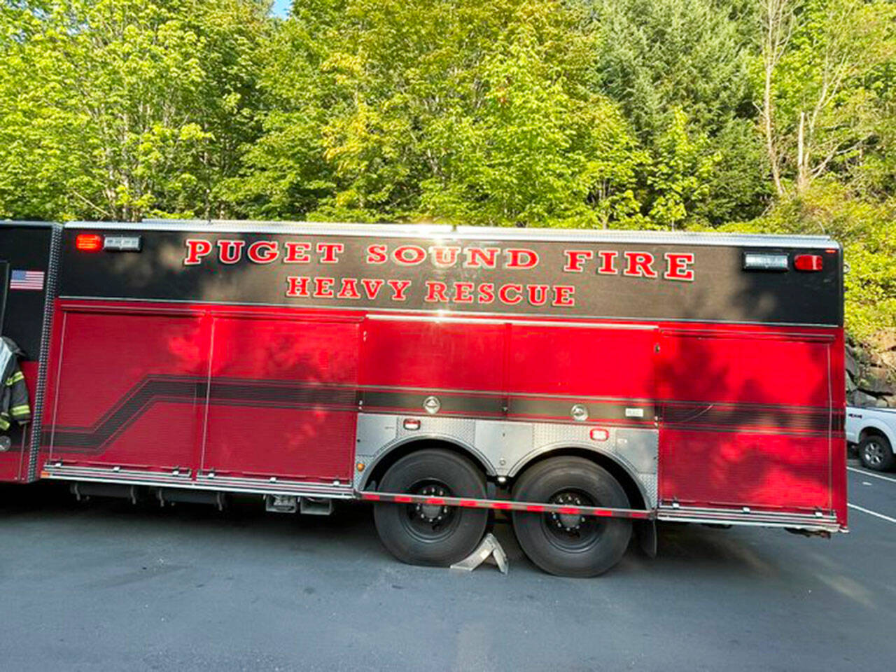 Puget Sound Fire responded with its heavy rescue unit after a sedan went off Canyon Drive Aug. 28. A Kent man died in the crash. COURTESY PHOTO, Puget Sound Fire
