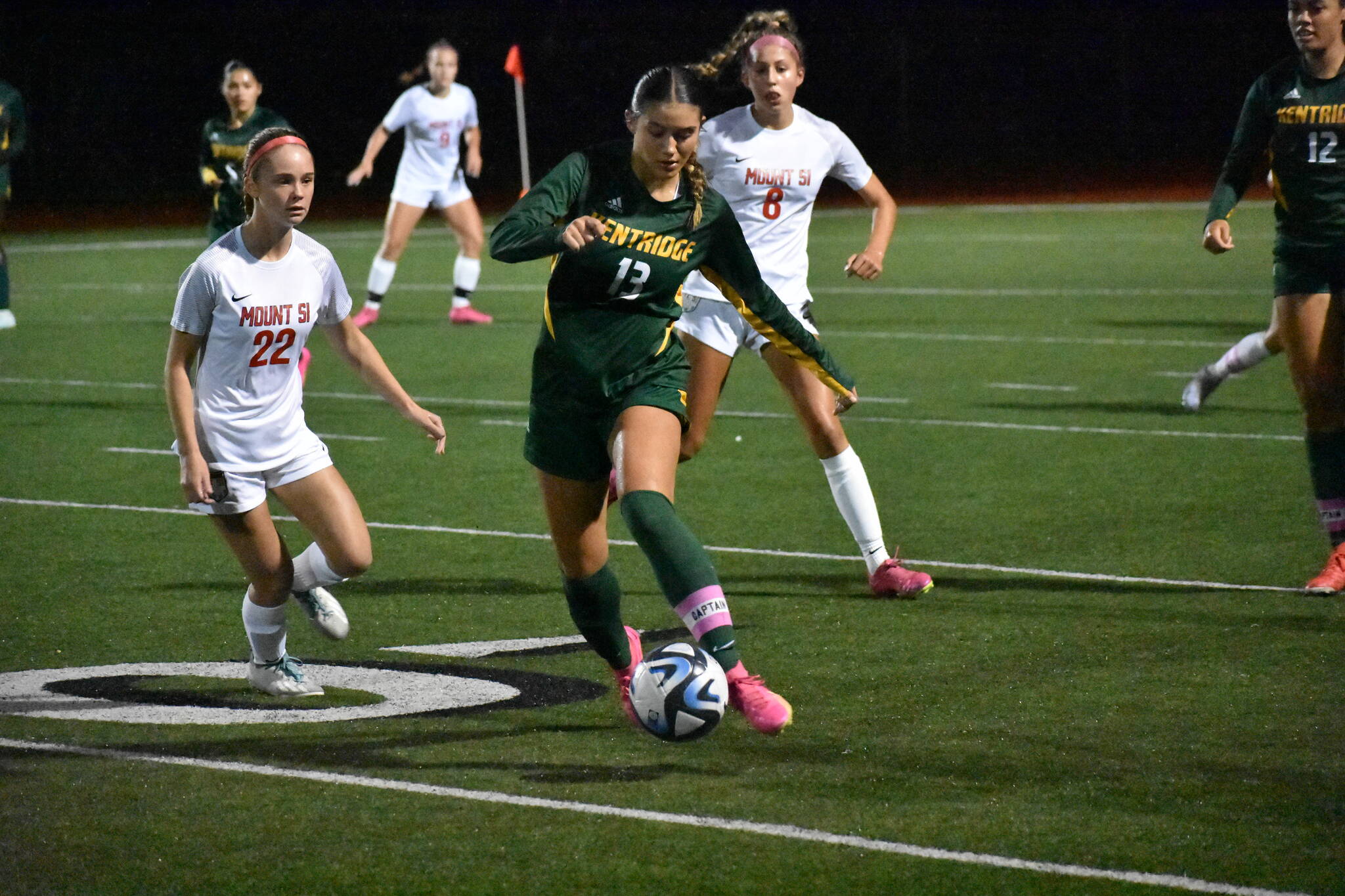 Senior Ella Schug with the ball at her feet. Ben Ray / The Reporter