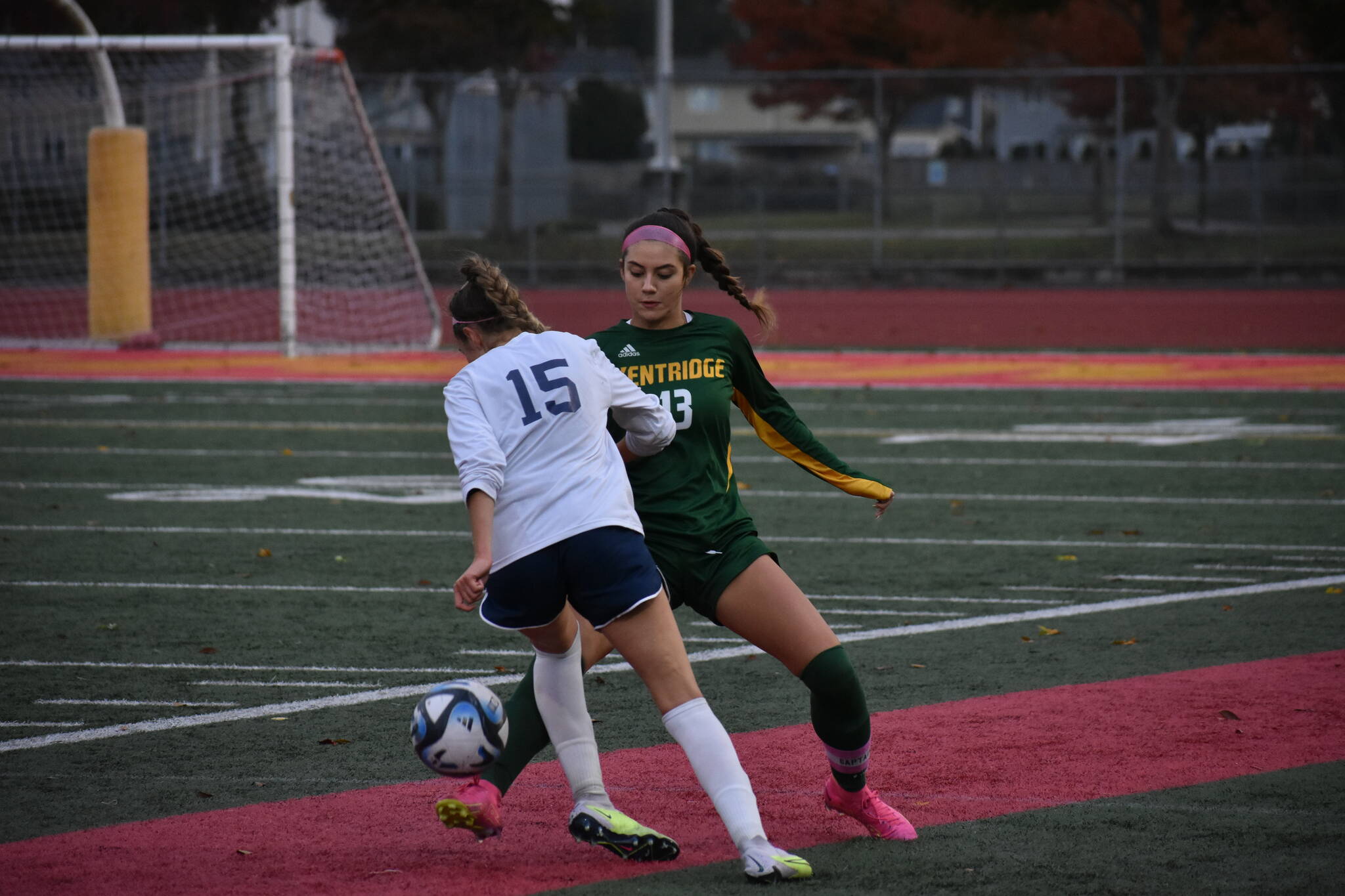 Ella Schug steals the ball away from a Rogers player. Ben Ray / The Reporter