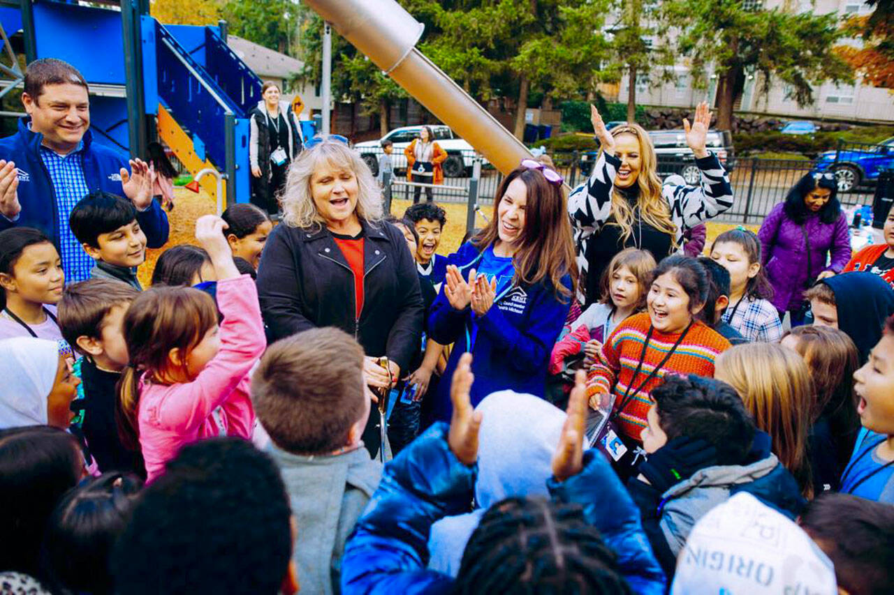 Parkside Elementary School students join Brian Levenhagen, city of Kent deputy parks director, far left; Mayor Dana Ralph; City Councilmember Zandria Michaud; and Parks Director Julie Parascondola at a ribbon cutting for the renovated Salt Air Vista Park on the West Hill. COURTESY PHOTO, City of Kent