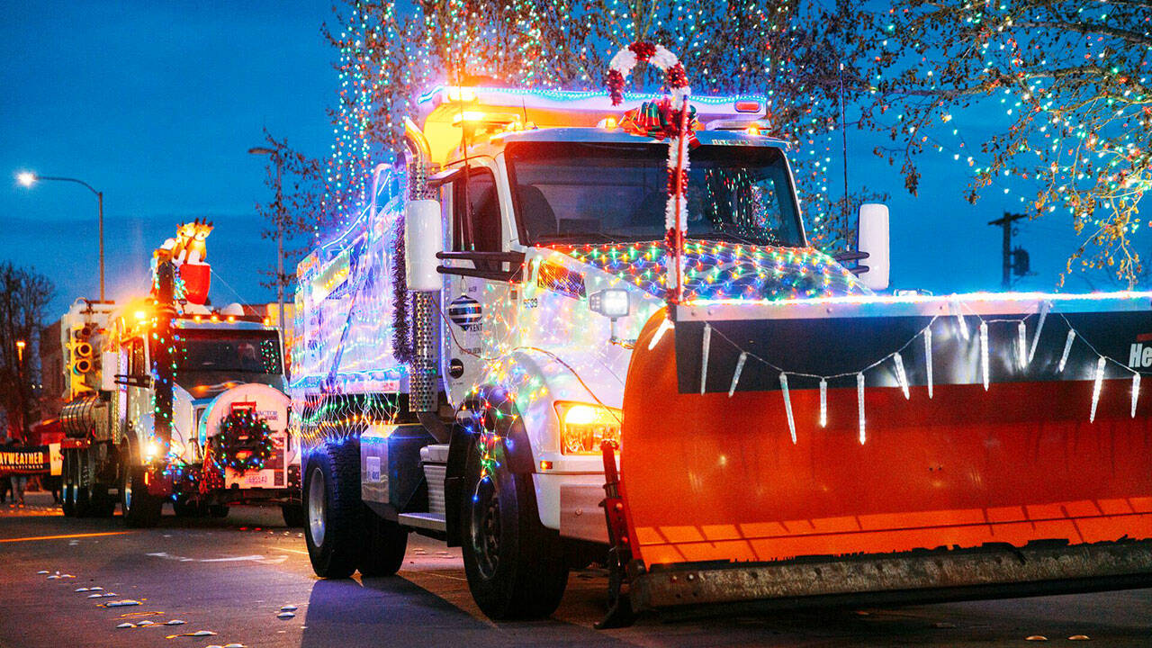 Decorated city of Kent Public Works trucks in the Winterfest parade. COURTESY PHOTO, City of Kent