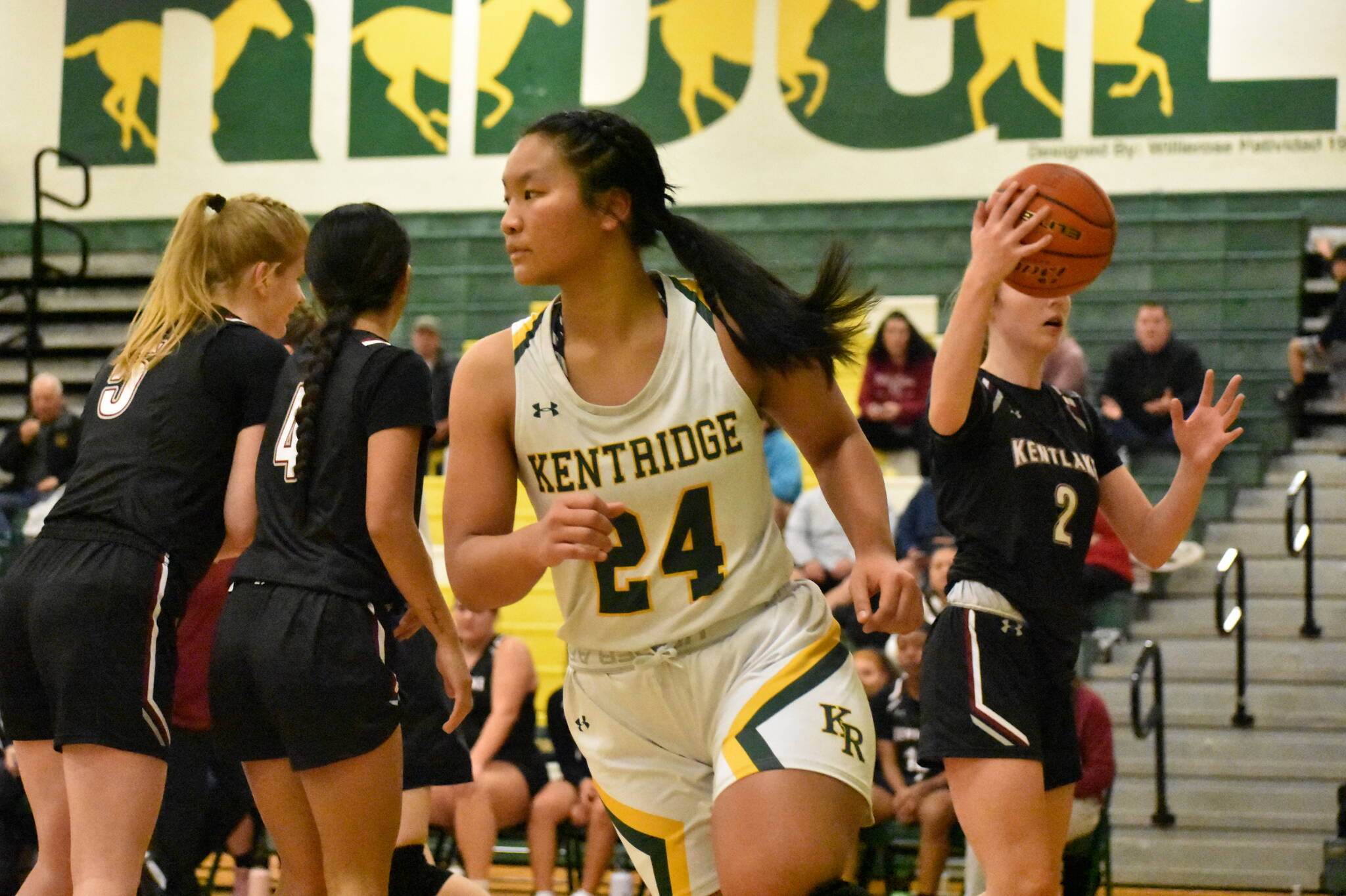 Jayla Koewla runs back down the court after a made basket in the fist quarter. Ben Ray / The Reporter