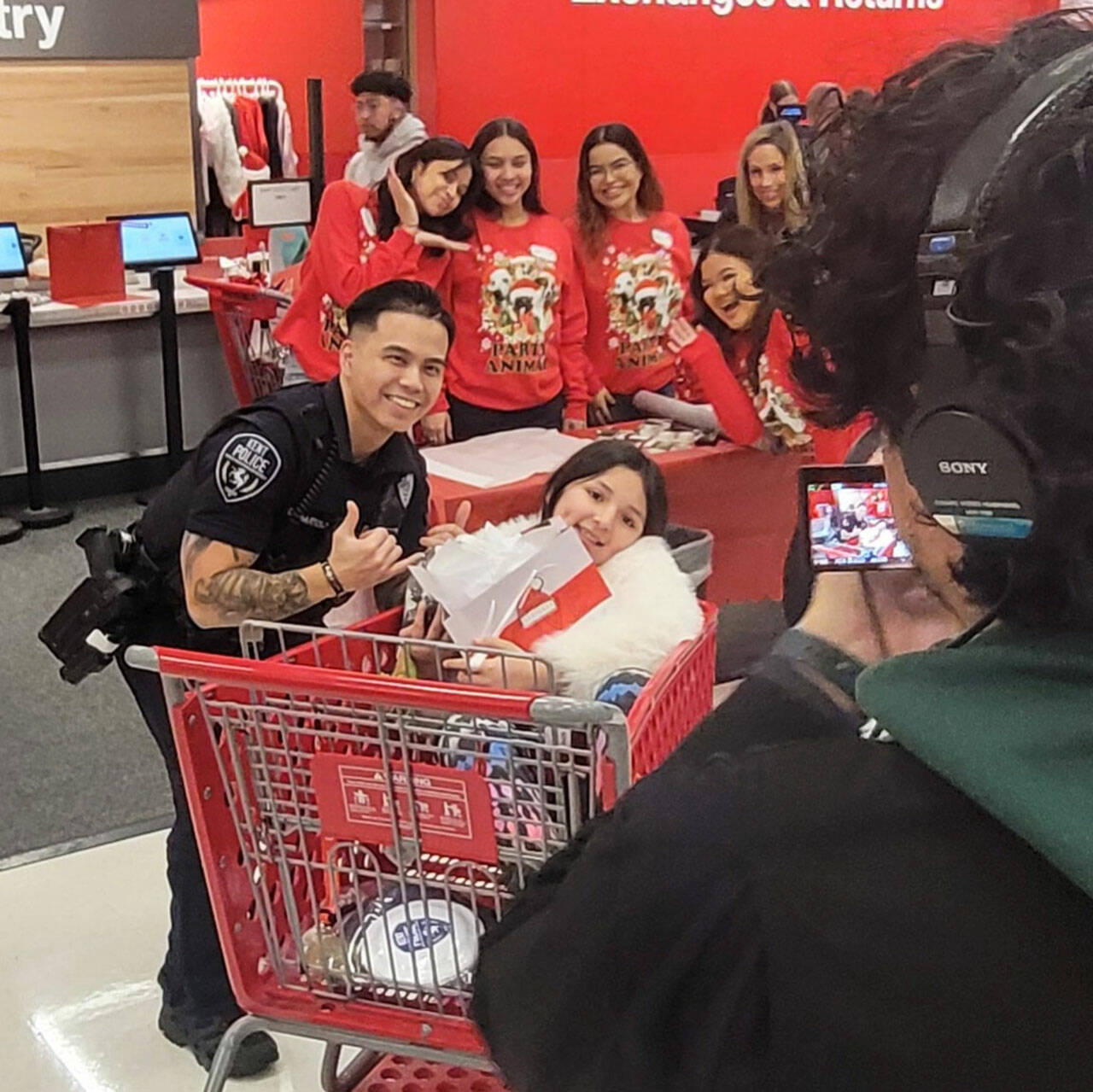 The 10th anniversary of the Kent Police Department’s Shop with a Cop was Dec. 9 at Target on the East Hill. COURTESY PHOTO, Kent Police