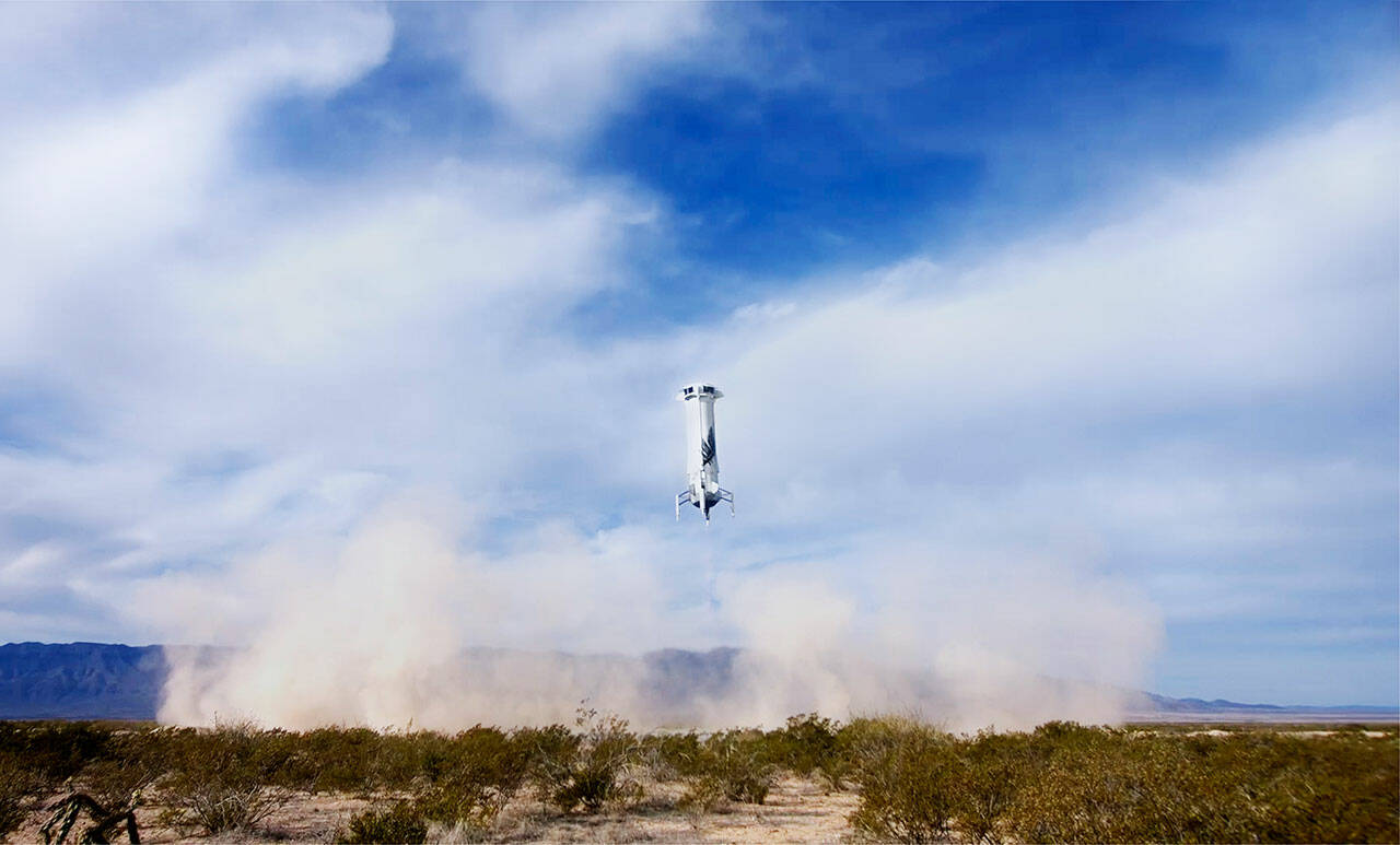 Blue Origin’s New Shepard booster landing in West Texas on Dec. 19. COURTESY PHOTO, Blue Origin