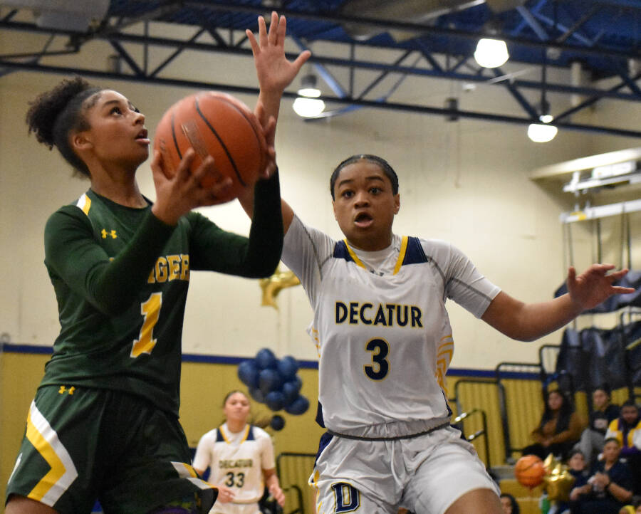 Kalia Washington goes up on a fast break lay-up vs. Decatur. Ben Ray / The Reporter