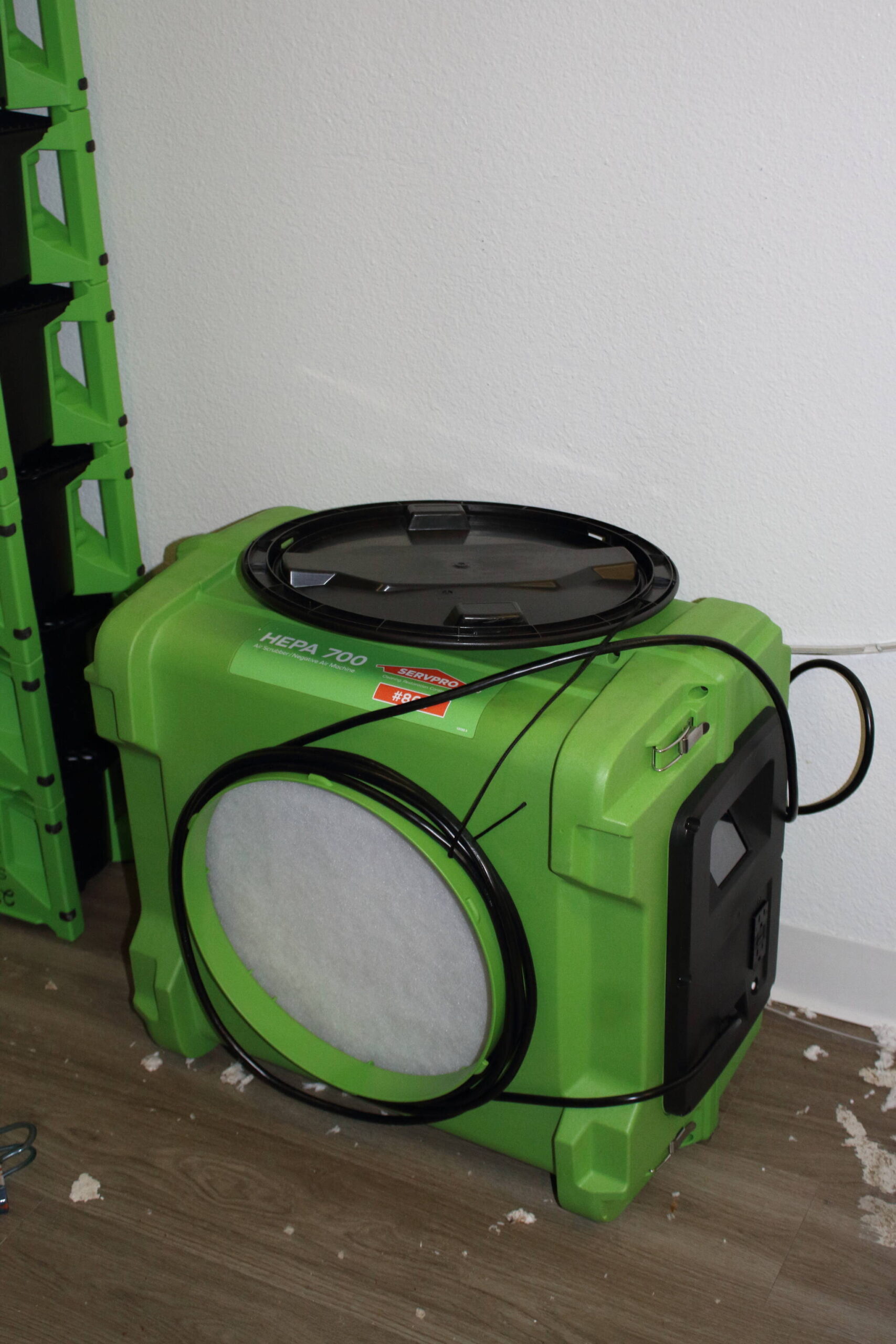 This dehumidifier was provided by the Miro Apartments for a tenant to dry the space before repairs can begin. Photo by Keelin Everly-Lang / The Mirror
