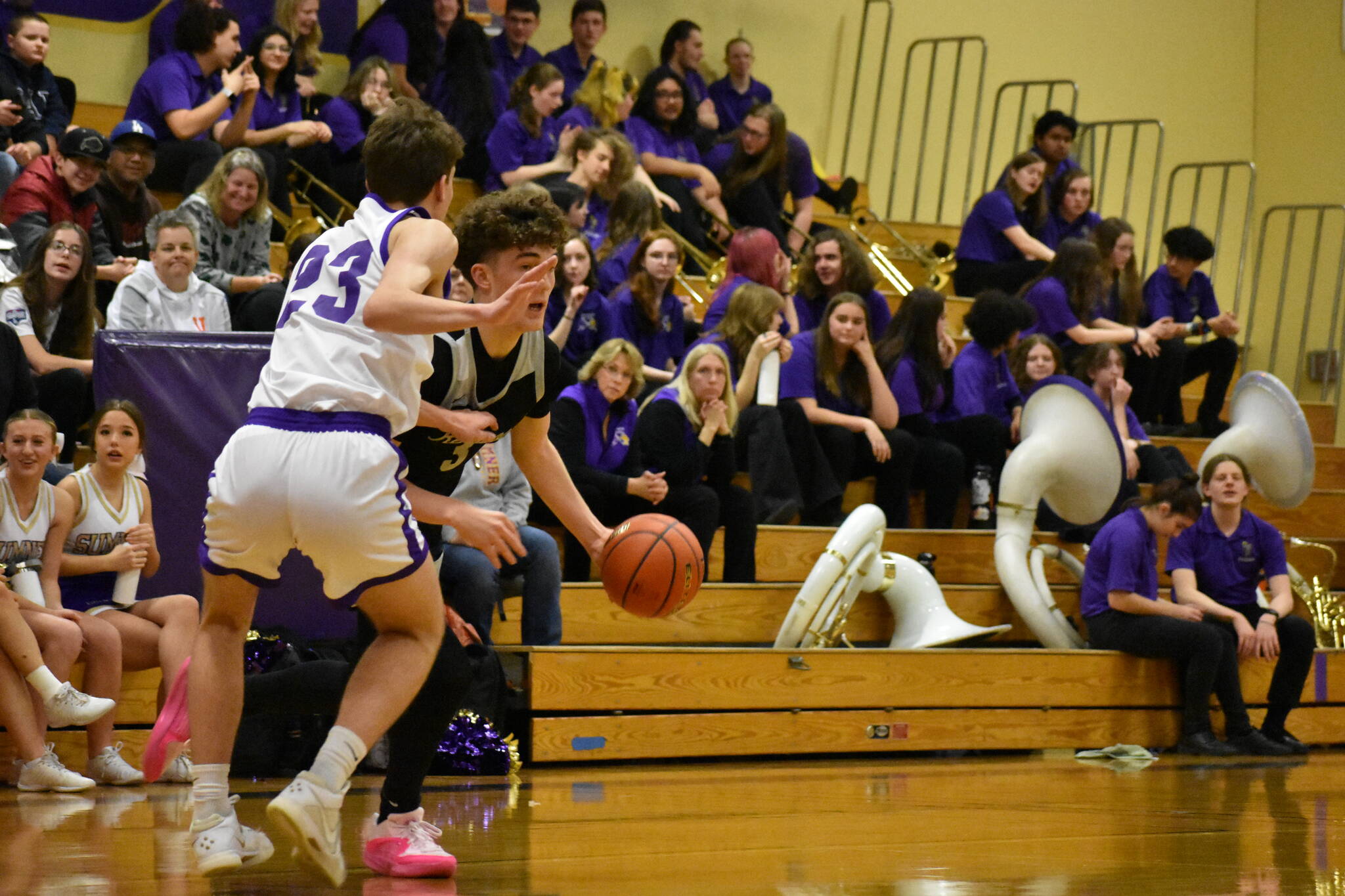 Blake Stempniak driving to the rack with a Sumner Spartan defending him on the perimeter. Ben Ray / The Reporter