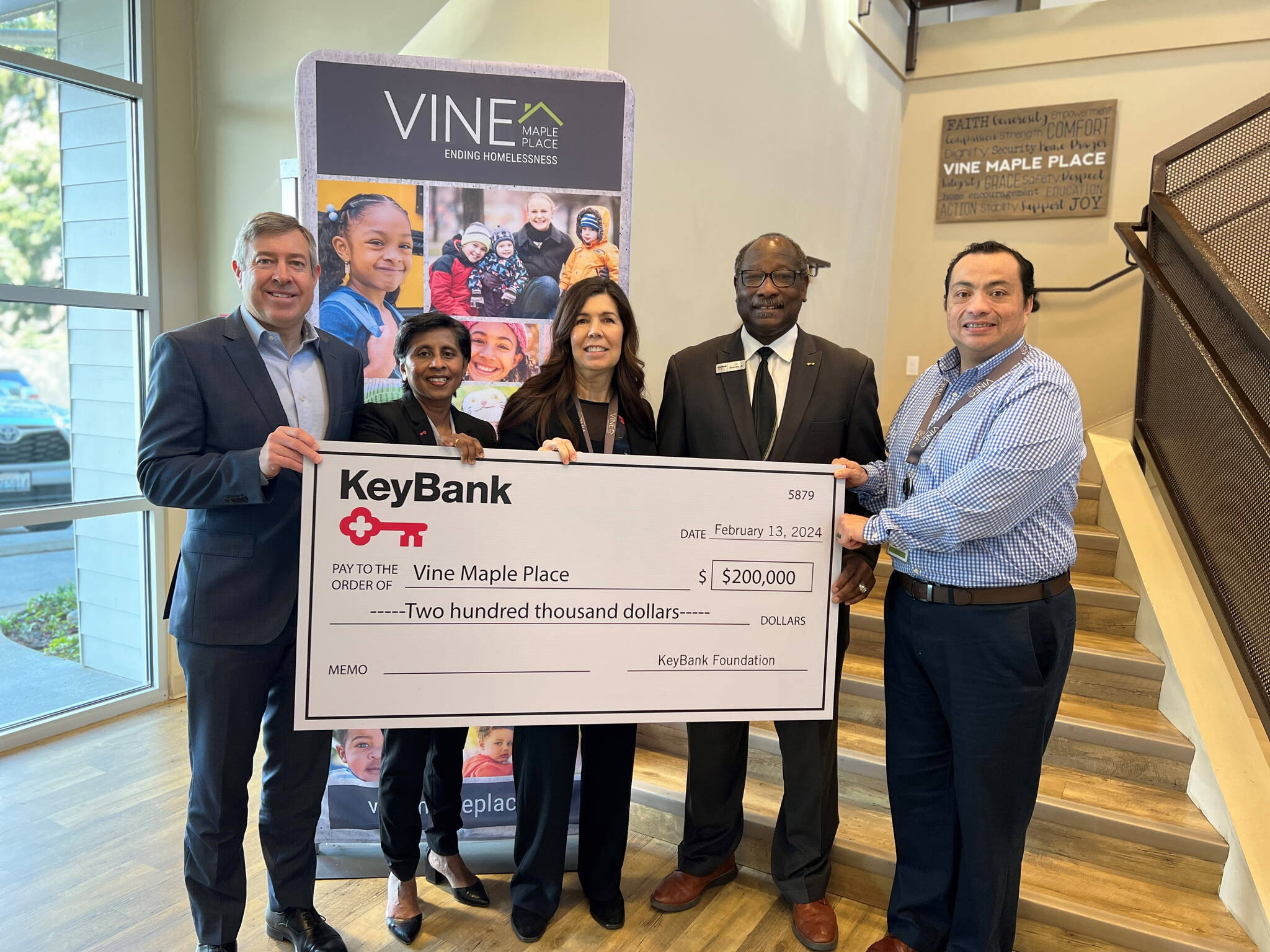 KeyBank presents a $200,000 grant to Vine Maple Place, with centers in Kent and Maple Valley to help homeless families. COURTESY PHOTO, KeyBank