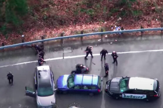 A screenshot of the King County Sheriff’s Office Guardian One helicopter view of the arrest of a Kent man after carjacking incidents Feb. 13 in Kent. COURTESY IMAGE, King County Sheriff’s Office