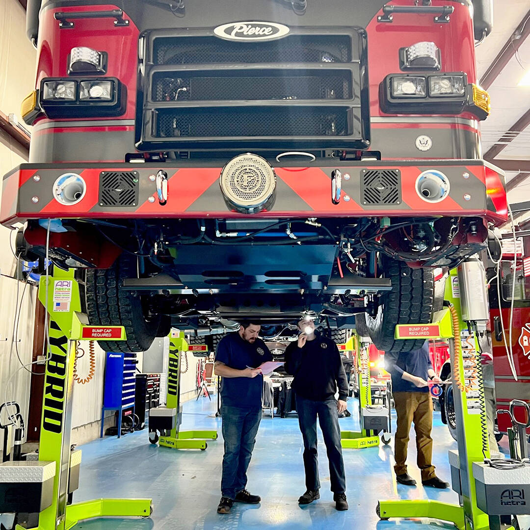 Puget Sound Fire employees inspect an engine at Pierce Manufacturing in Appleton, Wisconsin. COURTESY PHOTO, Puget Sound Fire