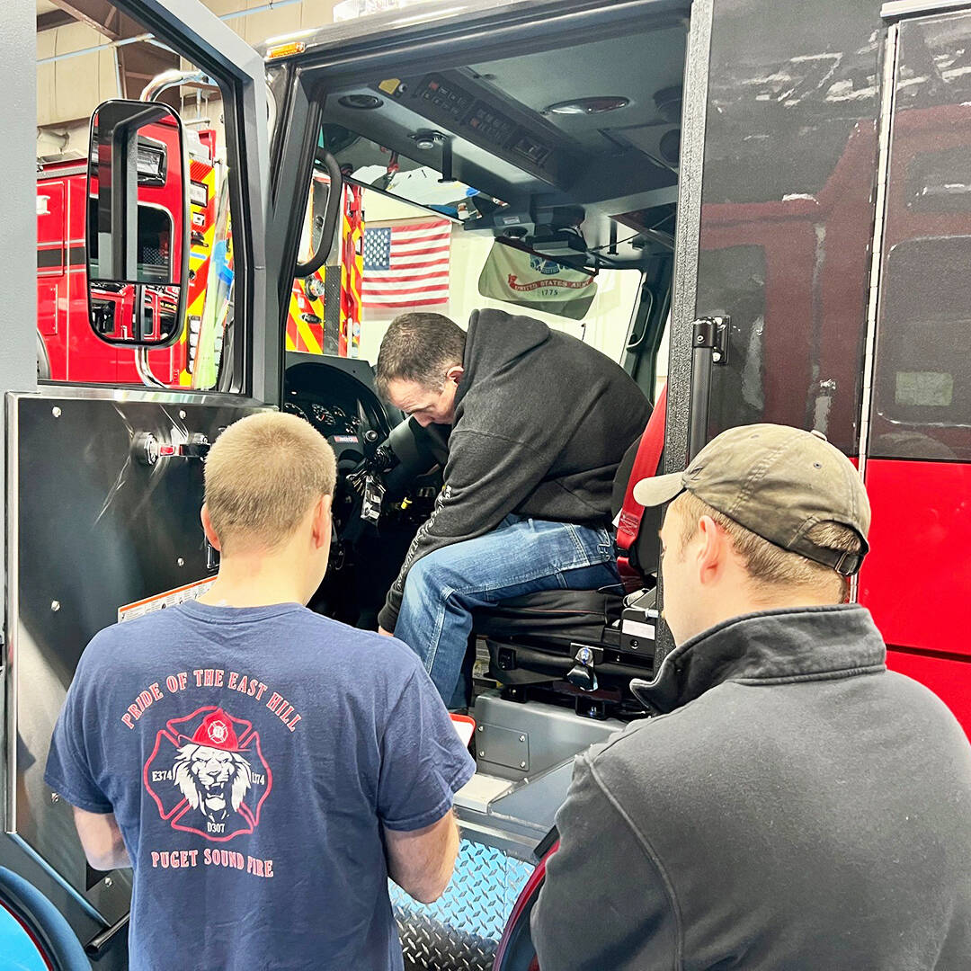 Puget Sound Fire staff take a close look at a newly built fire engine. COURTESY PHOTO, Puget Sound Fire