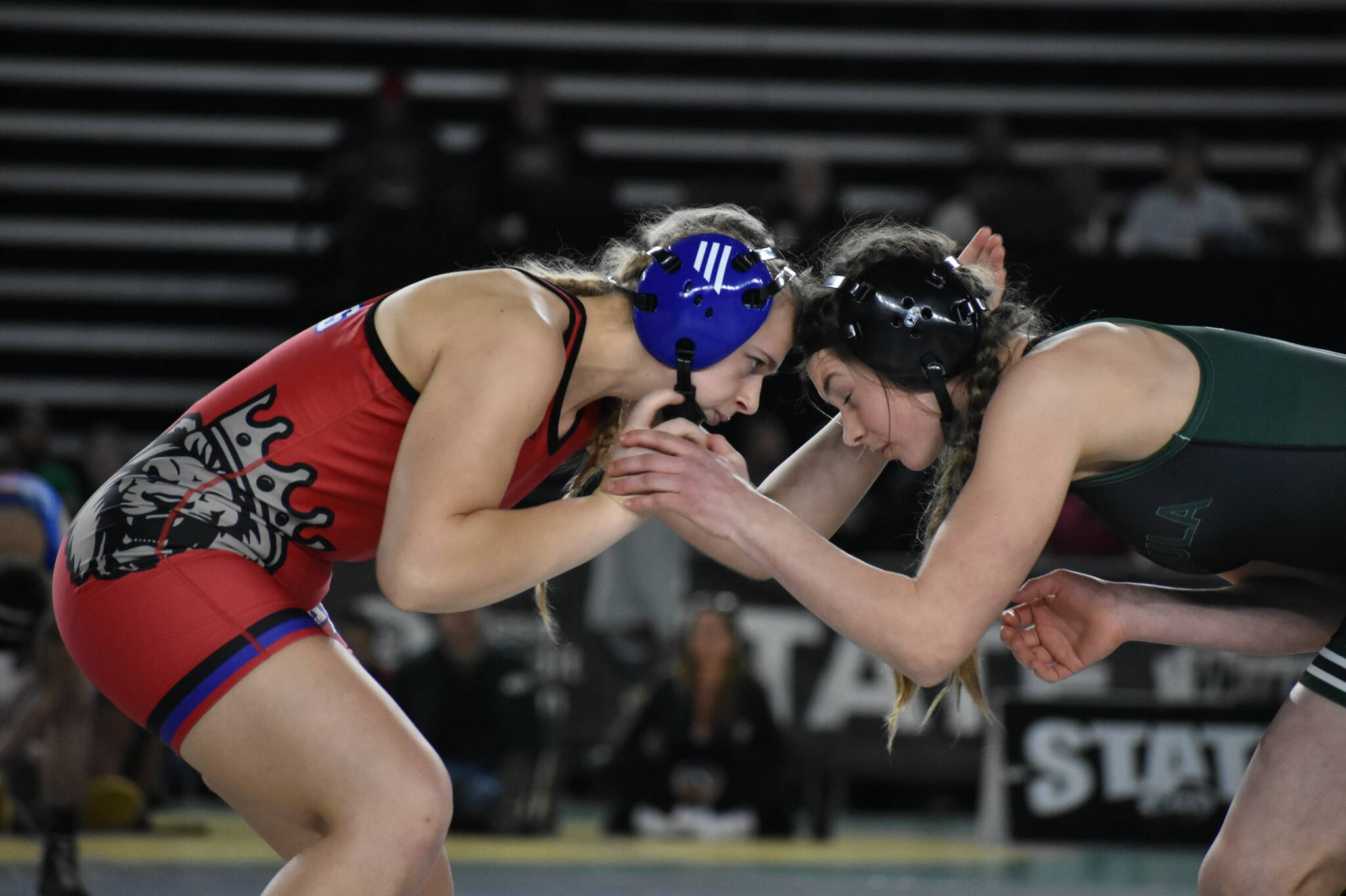 Oksana Galiant face-to-face with her opponent in the state championship. Ben Ray / The Reporter