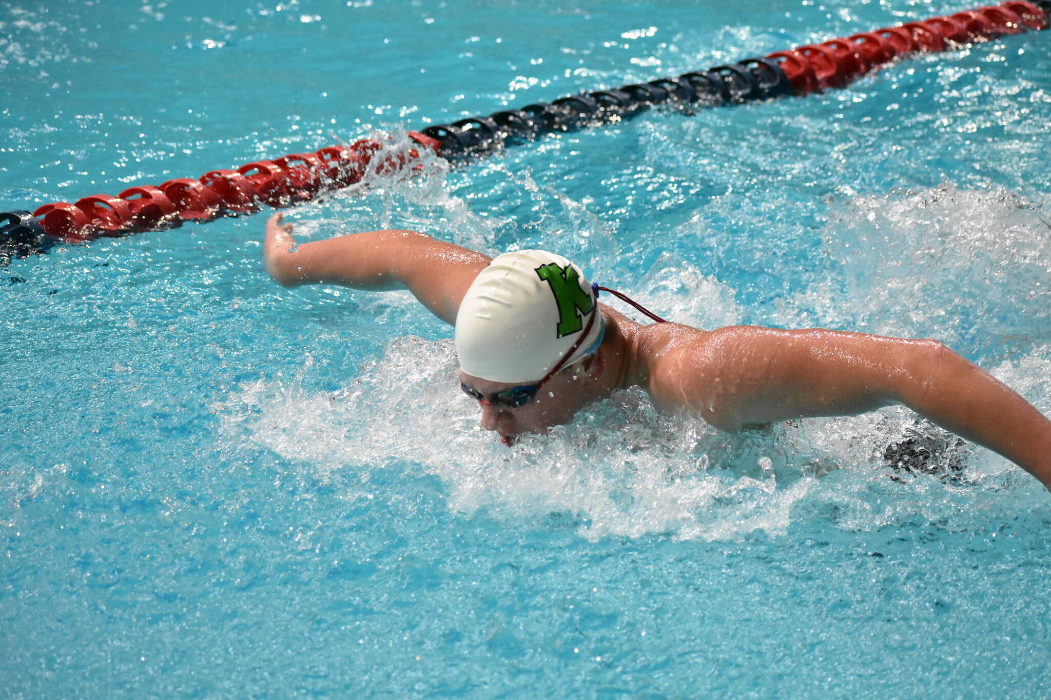 Kentwood swimmer in the fly section of the IM race. Ben Ray / The Reporter