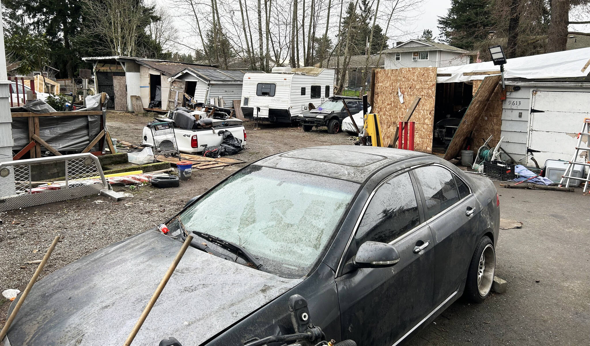 Kent Police executed a search warrant on an alleged chop shop on the East Hill at 9613 S. 240th St. COURTESY PHOTO, Kent Police