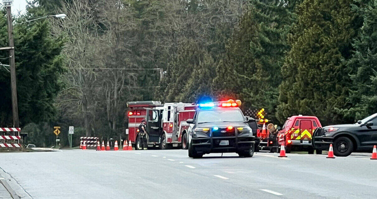 Emergency personnel respond Feb. 20 to 132nd Avenue SE where an 83-year-old man died of a medical emergency and crashed his vehicle. COURTESY PHOTO, Ernie Downes