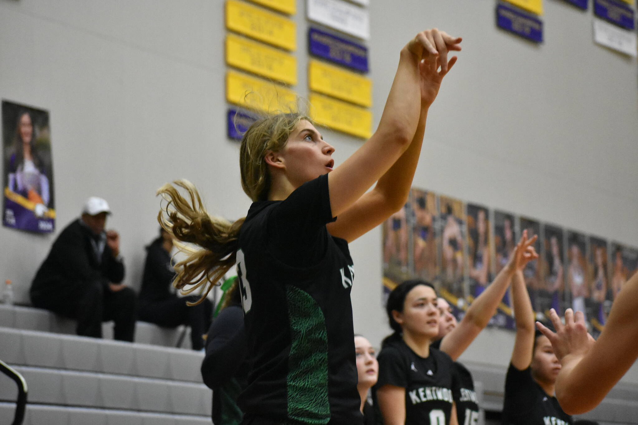 Niki Boris takes a three pointer at Issaquah High School in the regional playoff round. Ben Ray / The Reporter