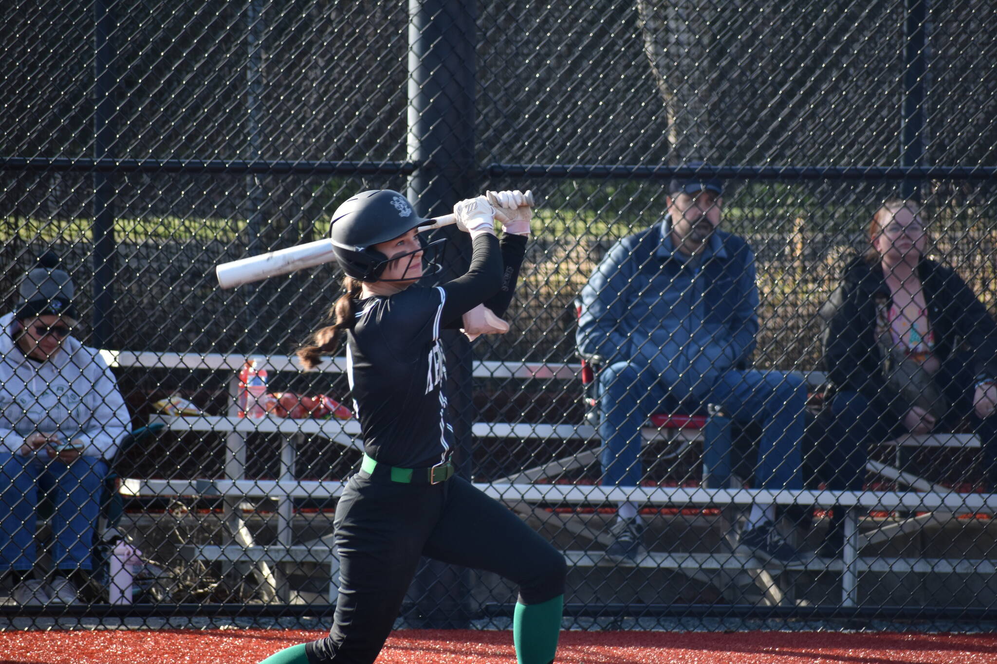 JJ Ursino hits her first knock of the game against Liberty. Ben Ray / The Reporter